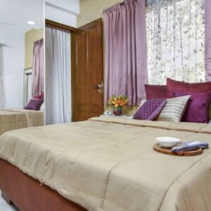 Contemporary 2BHK Flat Design with Hydraulic Storage Beds