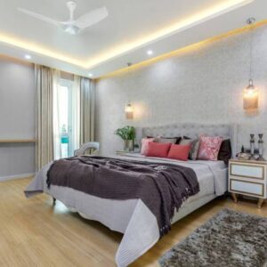 Contemporary 3BHK Flat Design with Beige Sofa and Blue Accent Chairs